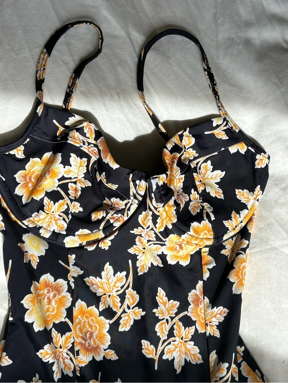 Auguste The Label Black One-Piece Bodysuit with Yellow Floral Print